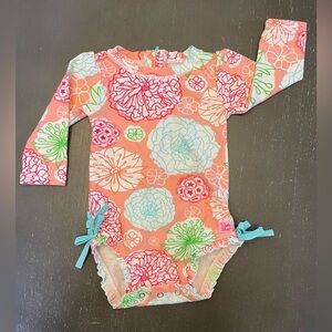 Ruffle Butts Orange Floral Kids Swim Rashguard
